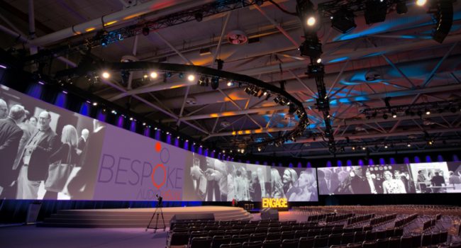 Giant curved screens make this Corporate Event Stand Out